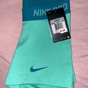 mint/turquoise nike pros